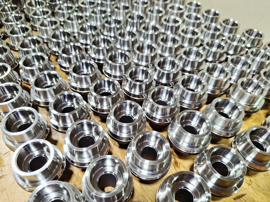 Production run of turned metal bushings